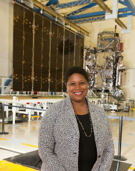 Jamese Sims pictured with the GOES-16 Satellite