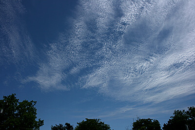 Morning cloud fluff, with gibbous Moon. : r/CLOUDS