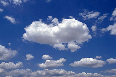 Cotton snow and cotton clouds in the sky. Cotton ball as a wool