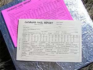 Photo of paper hail report.