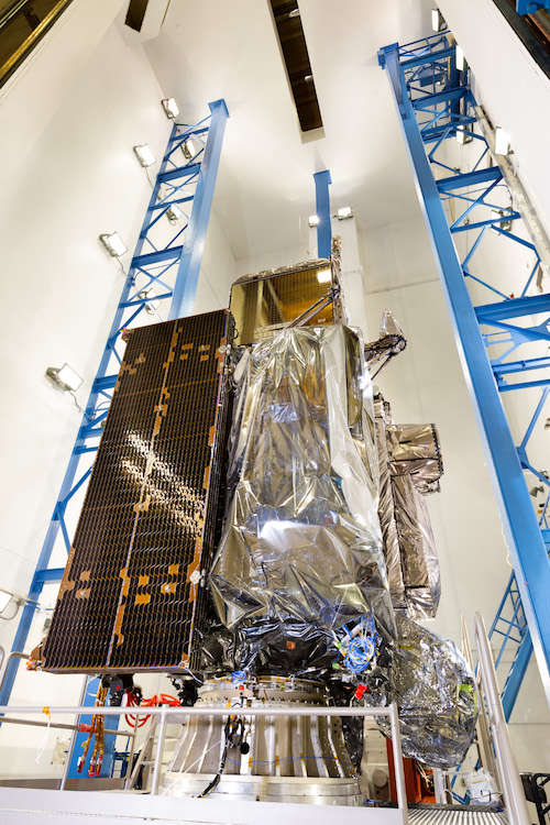 The spacecraft is installed on a shaker table for sine vibration testing at the RAL in Denver, Colorado.