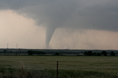 Photo of tornado touching ground.
