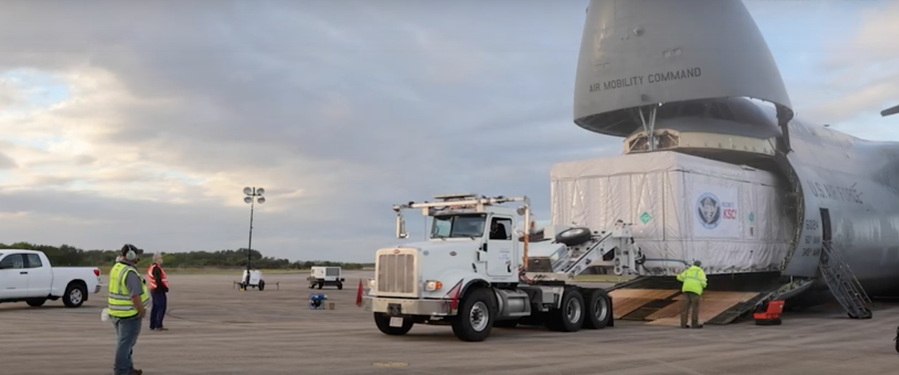 Image of GOES-T being loaded on the airplane