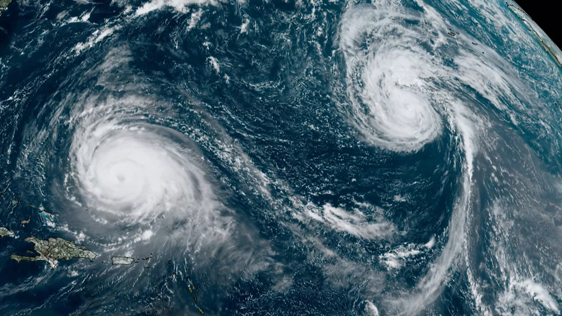 Image of two hurricanes over the Atlantic Ocean in 2023.