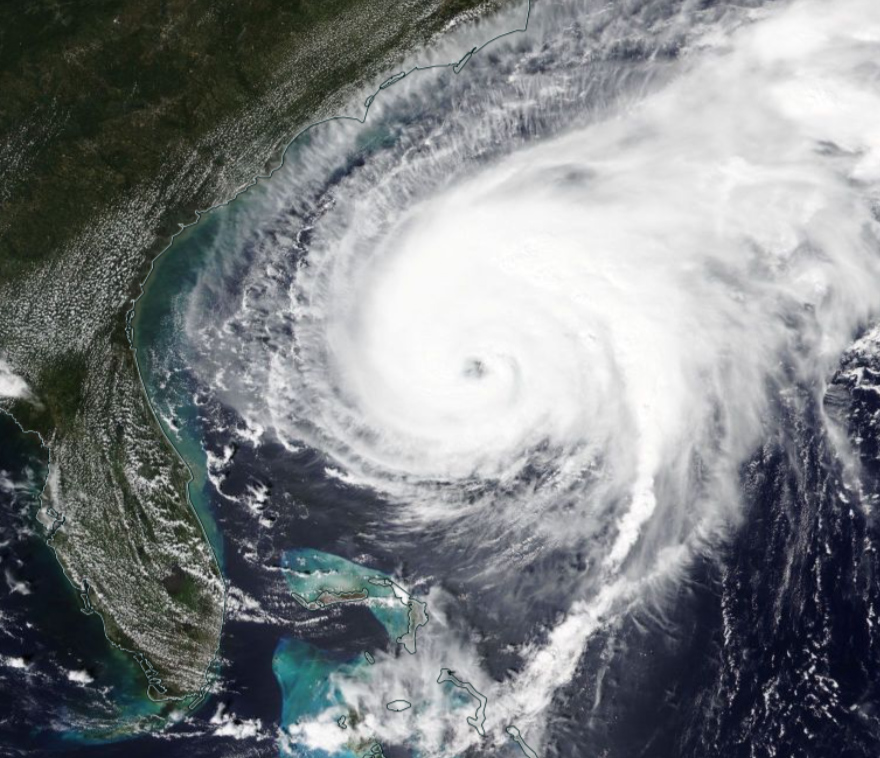 Satellite view of Hurricane Humberto on Sept 16, 2019, showing a well-defined eye, dense spiral cloud bands, and clear rotation off the southeastern U.S. coast.) Source: N20 VIIRS True Color via Worldview.