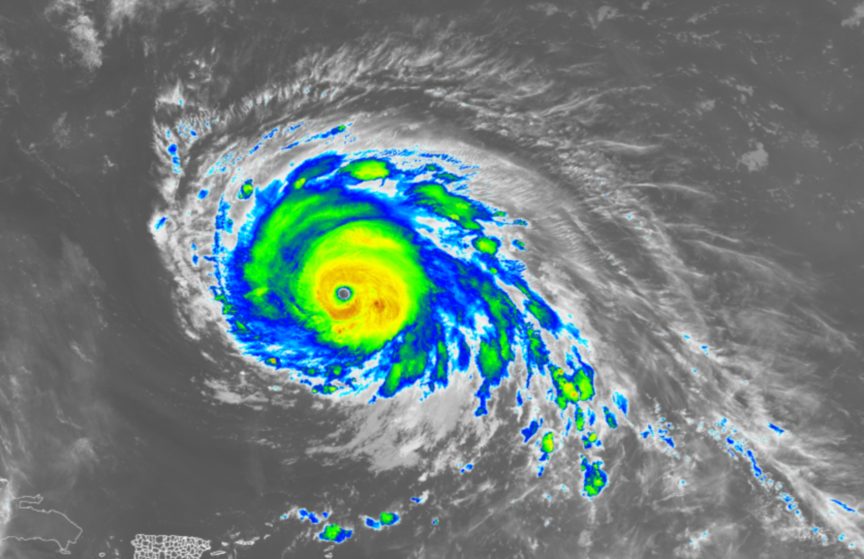 Infrared VIIRS image shows Hurricane Humberto on September 28, 2025, with a distinct eye and well-defined spiral bands east of the Caribbean.